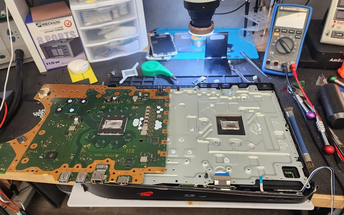 PlayStation 5 motherboard during board-level repair